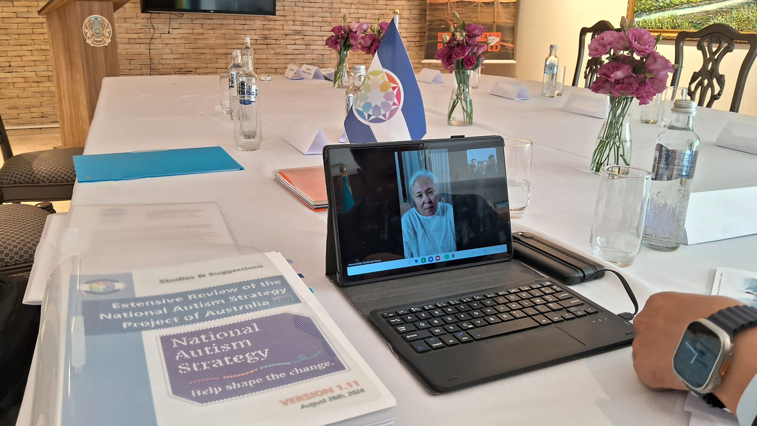Zhanat Karatay participating in the meeting by videoconference from Kazakhstan.
